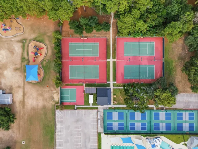 a view of a swimming pool with a patio