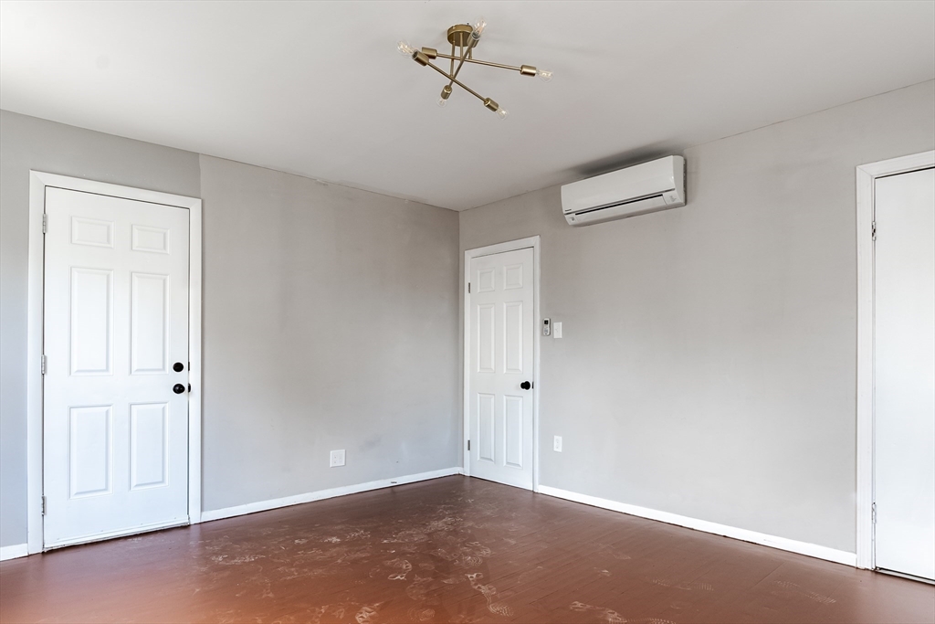 50 Tecumseh Street Fall River, MA 02721 - Photo 19 of 36 wooden floor in an empty room