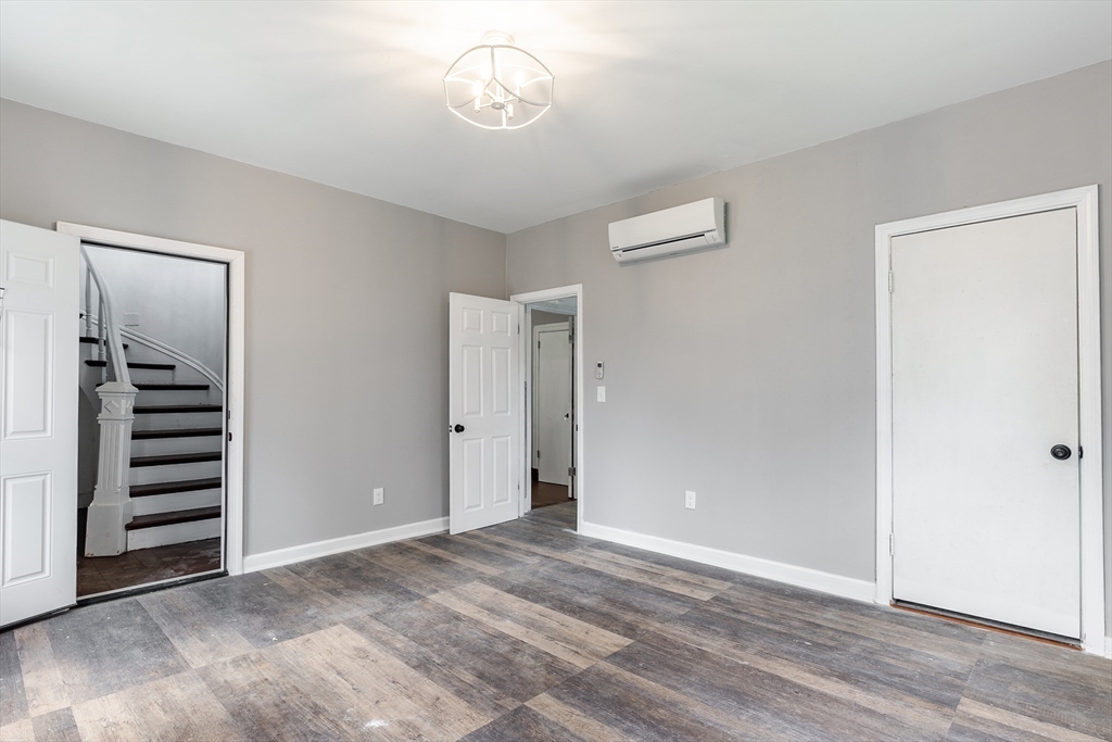 50 Tecumseh Street Fall River, MA 02721 - Photo 7 of 36 wooden floor in an empty room