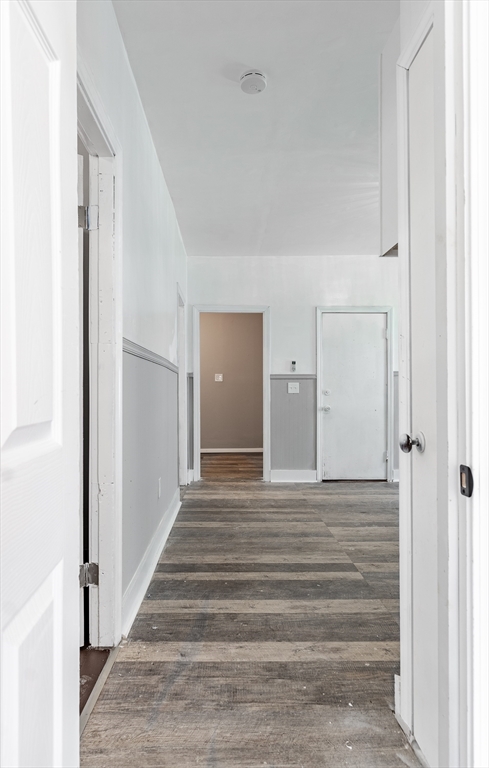 50 Tecumseh Street Fall River, MA 02721 - Photo 9 of 36 a view of a hallway with wooden floor and entryway