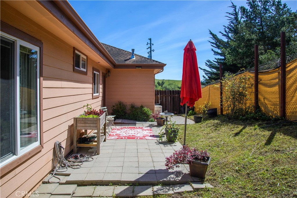 3199 Eton Road Cambria, CA 93428 - Photo 26 of 30 a front view of a house with a yard
