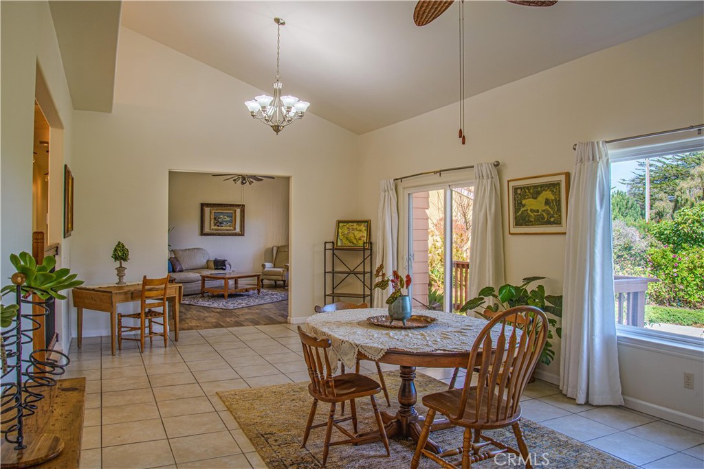 3199 Eton Road Cambria, CA 93428 - Photo 3 of 30 a view of a dining room with furniture and chandelier