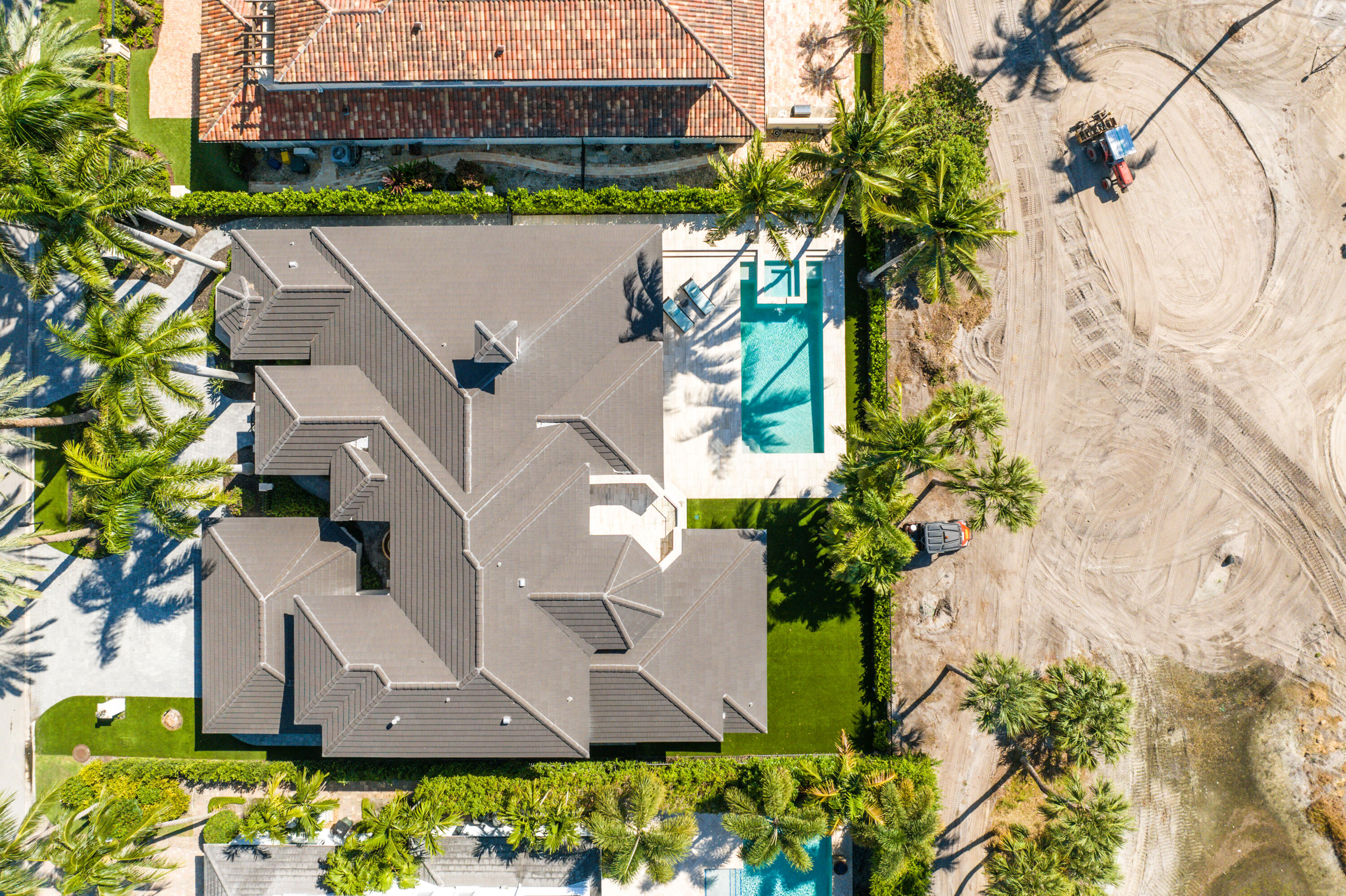 1655 Royal Palm Way Boca Raton, FL 33432 - Photo 54 of 76 an aerial view of a house with a yard