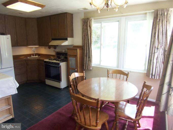 9714 Dilston Road Silver Spring, MD 20903 - Photo 15 of 19 Dining Room