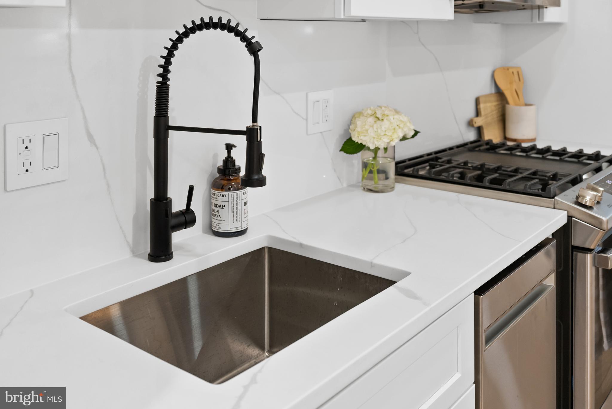1714 Euclid Street Northwest, Unit 1 Washington, DC 20009 - Photo 4 of 24 Touchless Sink Faucet with SS appliances
