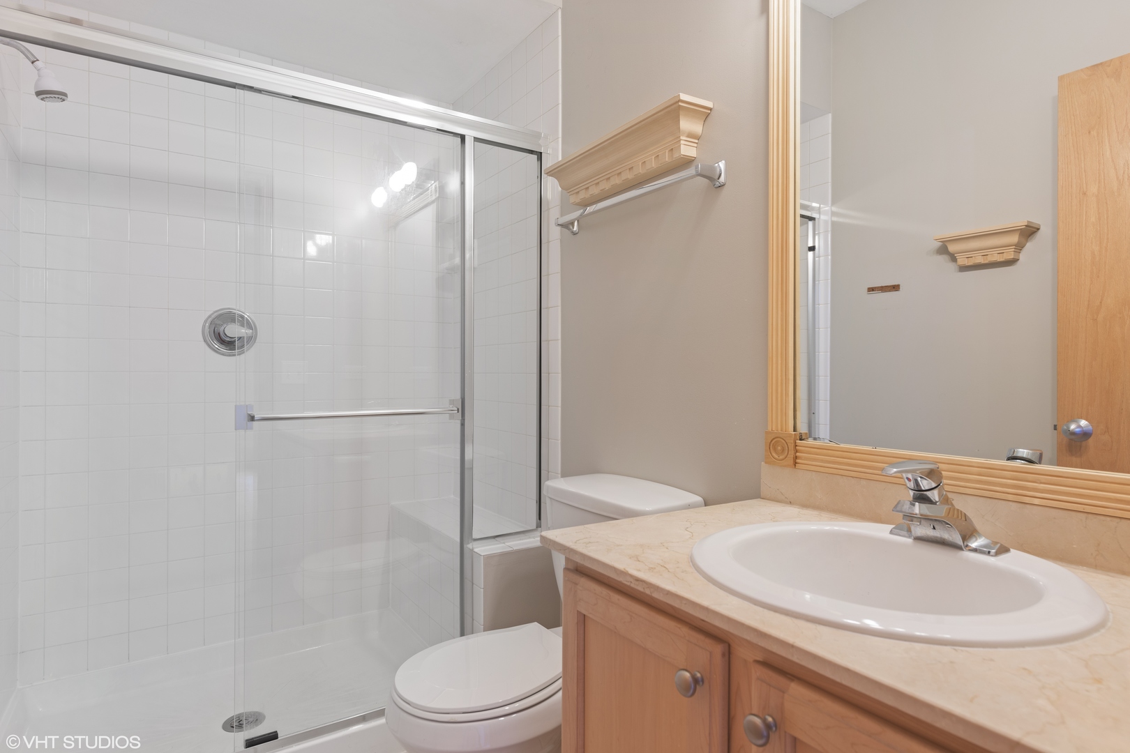 927 North Noble Street, Unit 1 Chicago, IL 60642 - Photo 10 of 10 a bathroom with a sink toilet and shower
