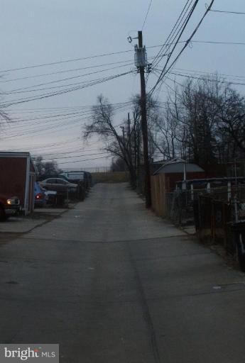 4346 Annapolis Road Halethorpe, MD 21227 - Photo 12 of 15 Back alley to parking pad