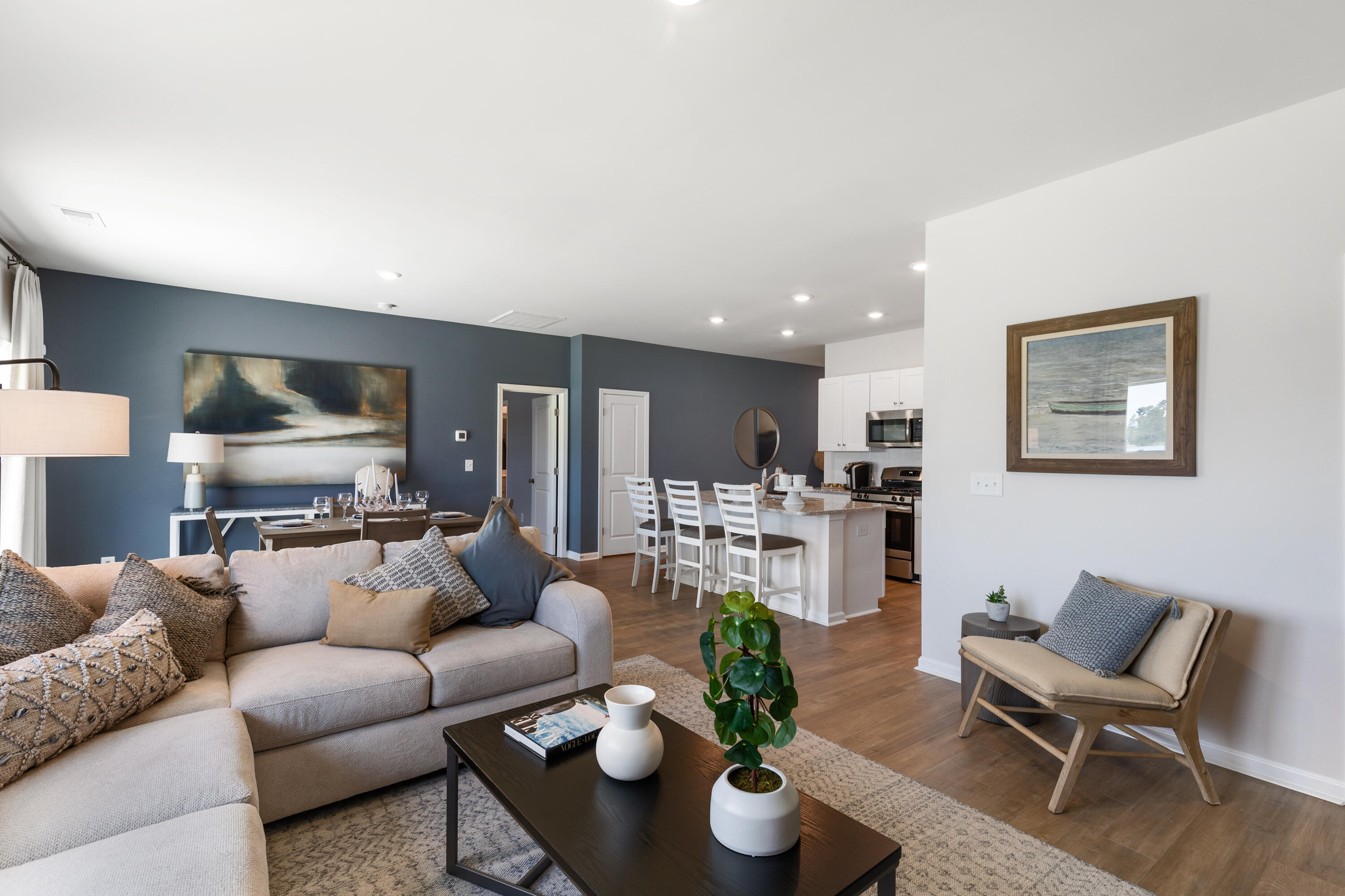 609 Winter Wren Way Moncks Corner, SC 29461 - Photo 7 of 14 Family Room into Kitchen
