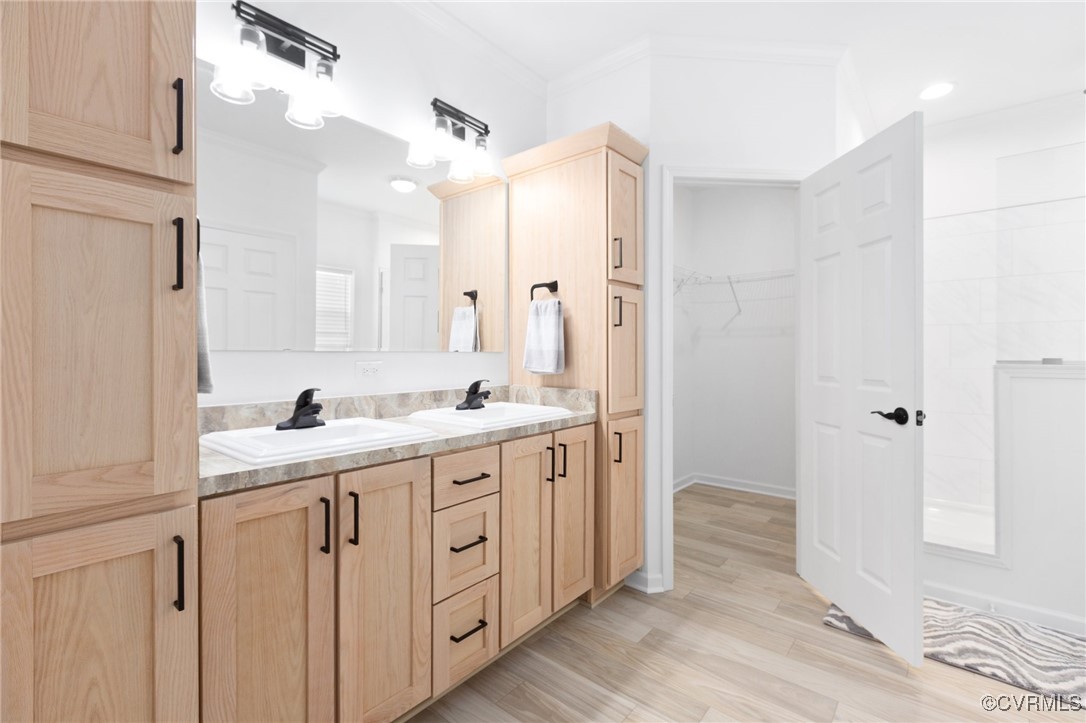 853 Levi Road Green Bay, VA 23942 - Photo 31 of 44 Full bath with double vanity, crown molding, wood