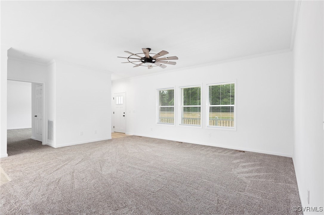 853 Levi Road Green Bay, VA 23942 - Photo 8 of 44 Carpeted spare room with baseboards, visible vents