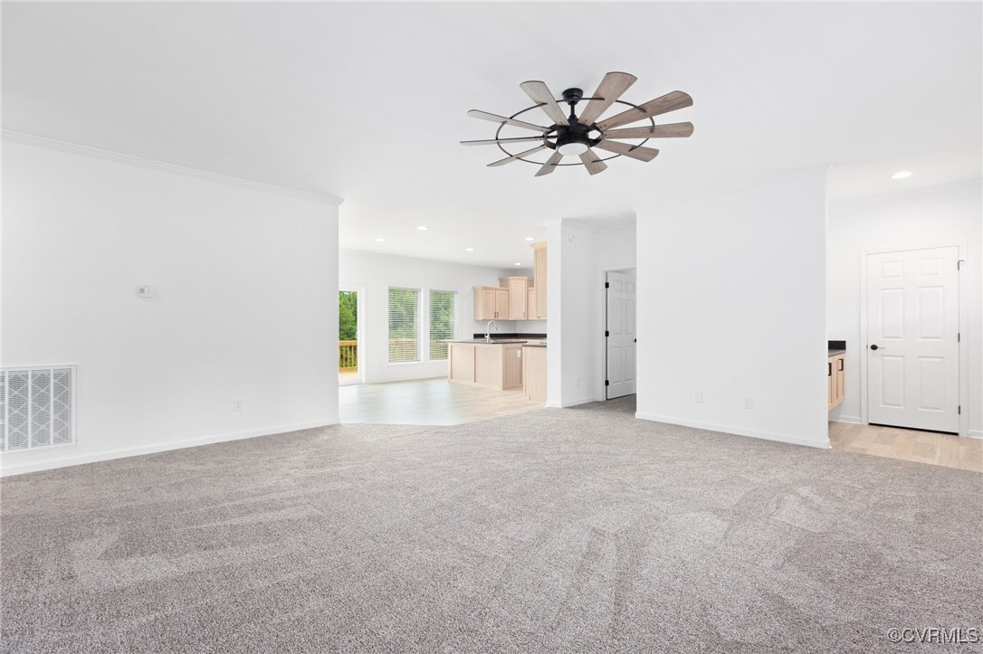 853 Levi Road Green Bay, VA 23942 - Photo 9 of 44 Unfurnished living room with recessed lighting, li