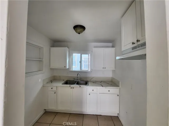 a room with window washer and dryer