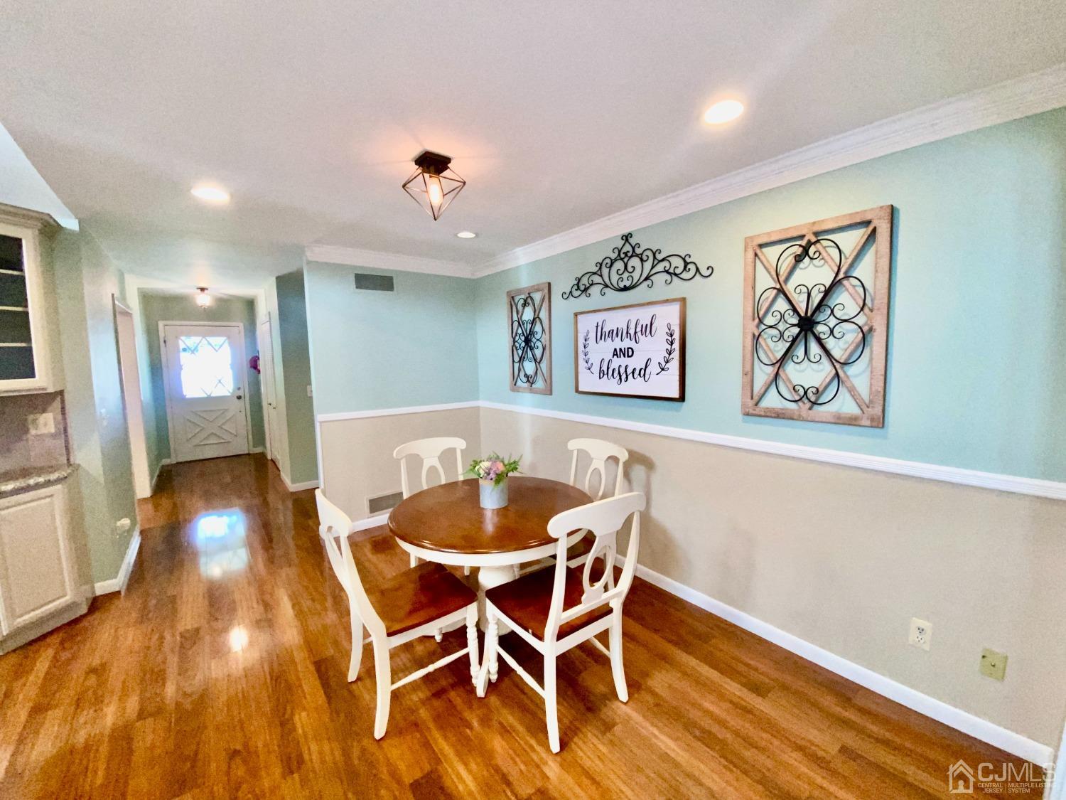 30 Woodland Road Franklin, NJ 07416 - Photo 12 of 34 a view of a dining room with furniture and wooden floor
