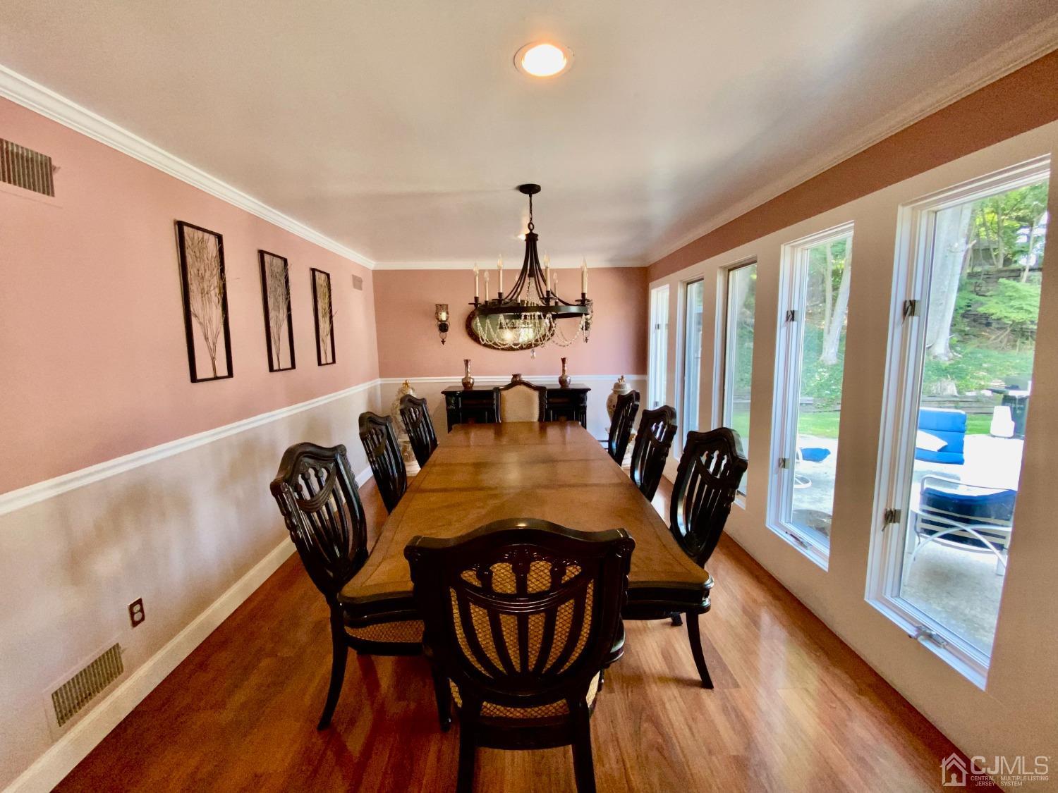 30 Woodland Road Franklin, NJ 07416 - Photo 13 of 34 a view of a dining room with furniture window and wooden floor