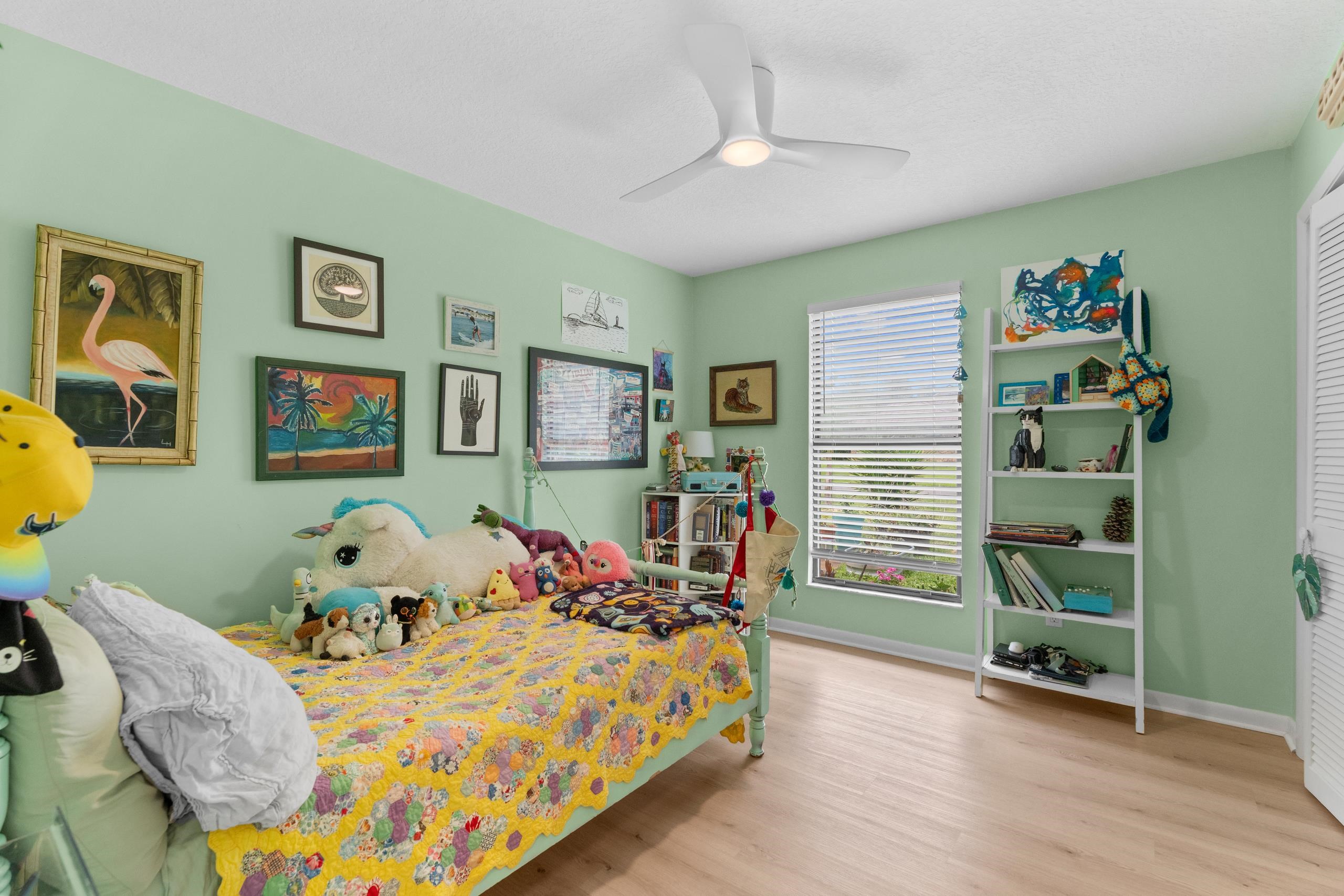 111 Pompano Road St. Augustine, FL 32086 - Photo 27 of 61 a bedroom with bed and wooden floor
