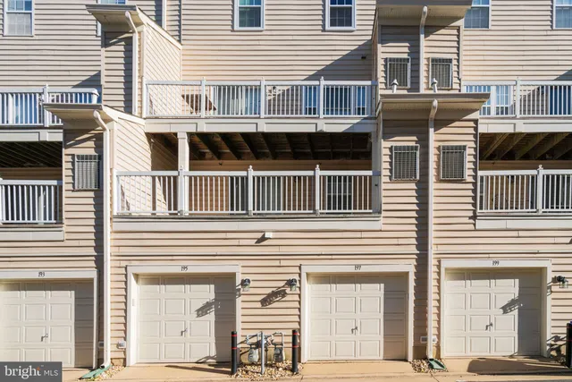 a sign that is in front of flowers