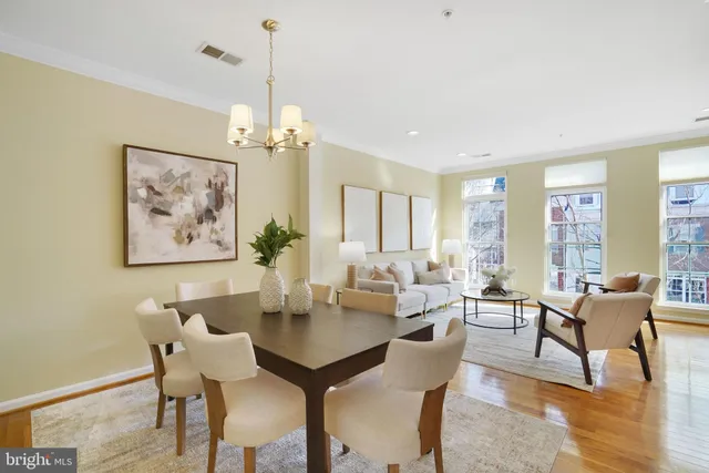 a dining room with furniture and a fireplace