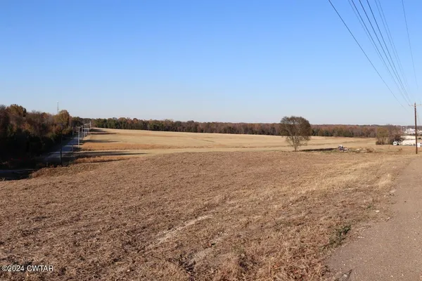 a view of a backyard of a house