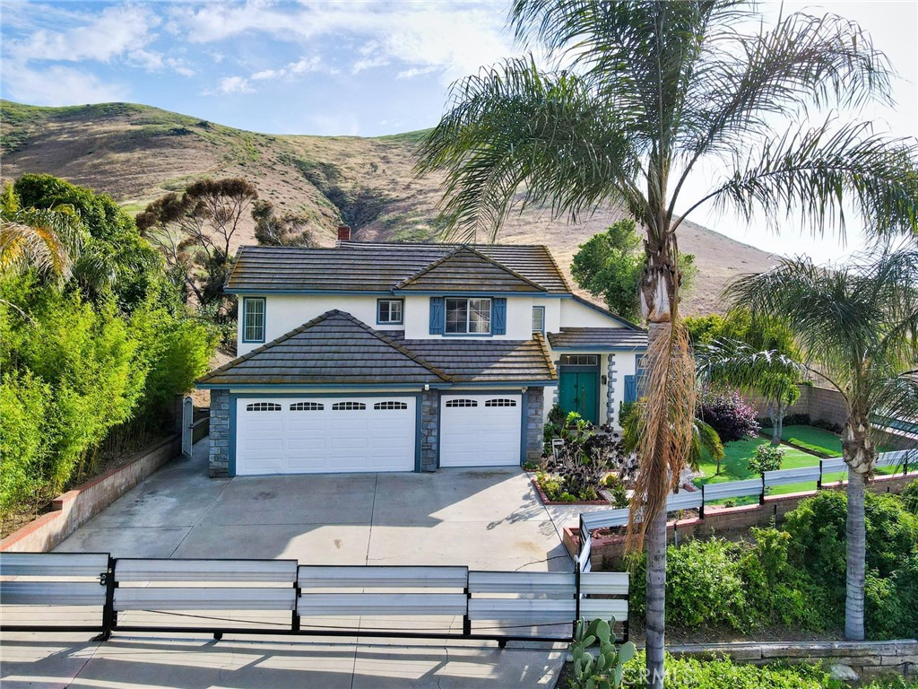 11336 Bentley Street Riverside, CA 92505 - Photo 1 of 1 a front view of a house with a yard