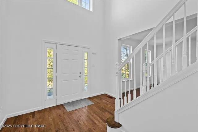 a view of entryway with a front door