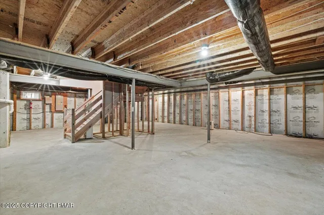 view of a city with lush green forest