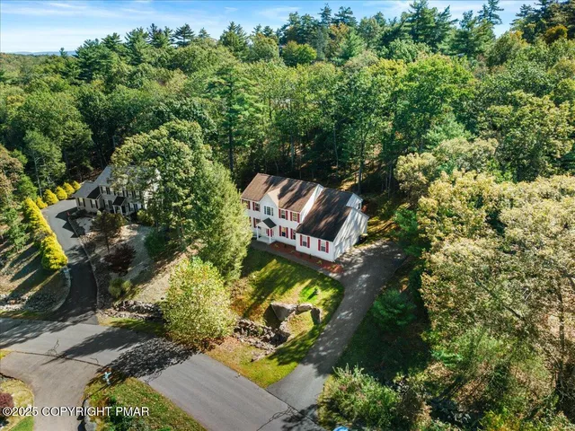 a view of a house with a big yard