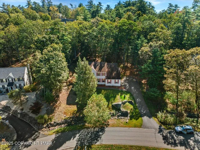 a view of swimming pool with a yard