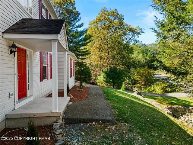 a kitchen with a sink stove top oven and cabinets