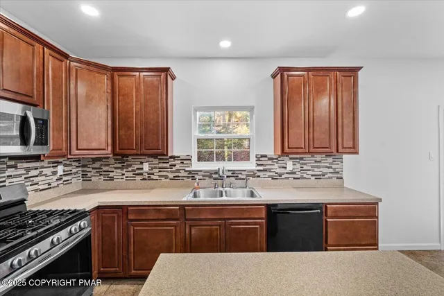 a room with refrigerator and table