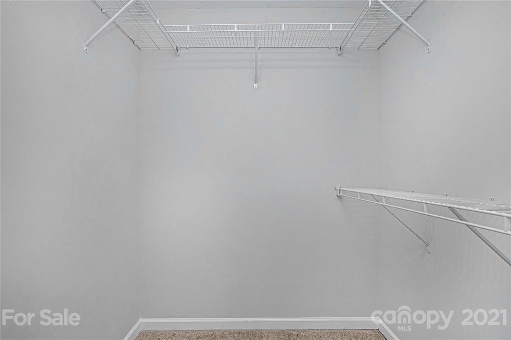 9230 Washam Potts Road Cornelius, NC 28031 - Photo 13 of 31 a view of small space with racks on the wall