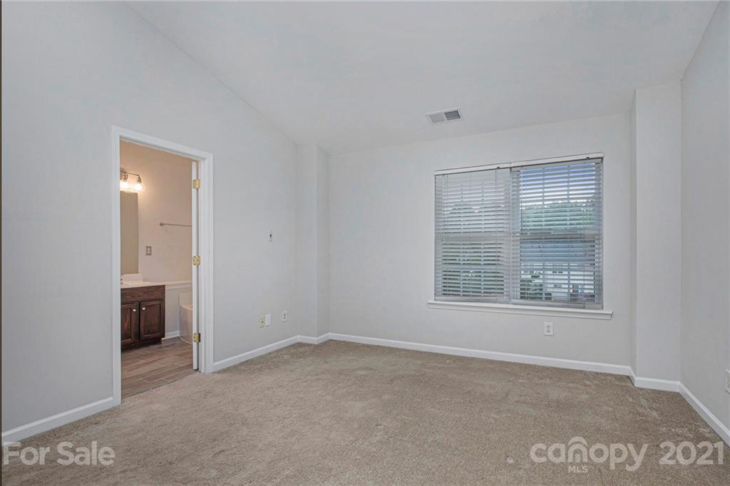 9230 Washam Potts Road Cornelius, NC 28031 - Photo 14 of 31 a view of an empty room with a window