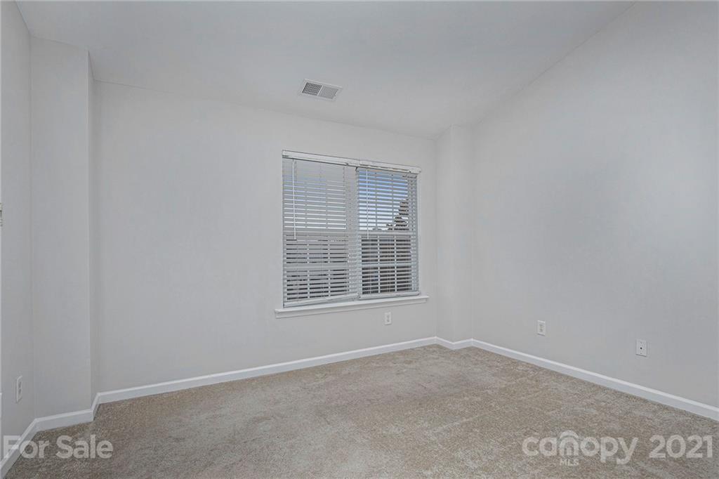 9230 Washam Potts Road Cornelius, NC 28031 - Photo 15 of 31 an empty room with a window