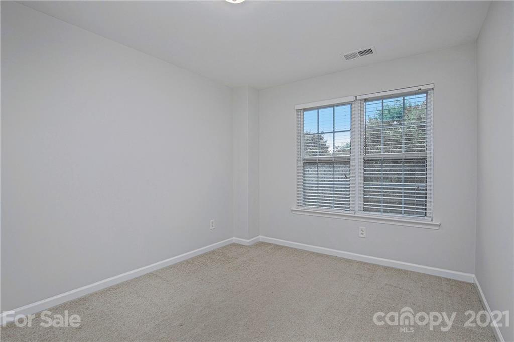 9230 Washam Potts Road Cornelius, NC 28031 - Photo 18 of 31 a view of an empty room with a window