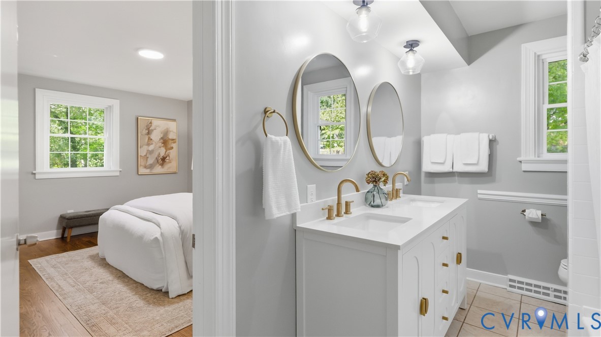 2301 Traymore Road North Chesterfield, VA 23235 - Photo 30 of 67 Dual vanity with gold-tone hardware and fixtures,