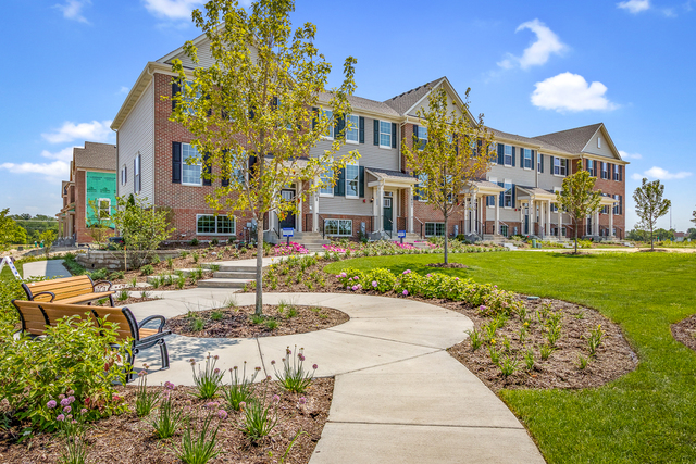 1627 Sager Way Batavia, IL 60510 - Photo 2 of 25 a view of a building with a garden