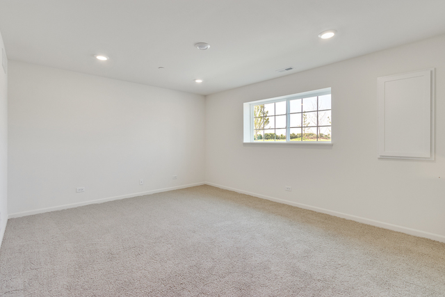 1627 Sager Way Batavia, IL 60510 - Photo 22 of 25 an empty room with windows