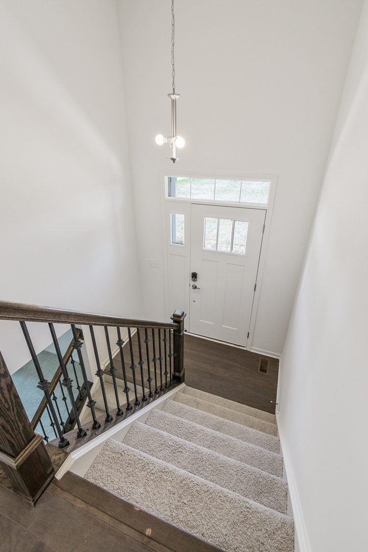 1627 Sager Way Batavia, IL 60510 - Photo 3 of 25 en suite bathroom with a sink and a mirror