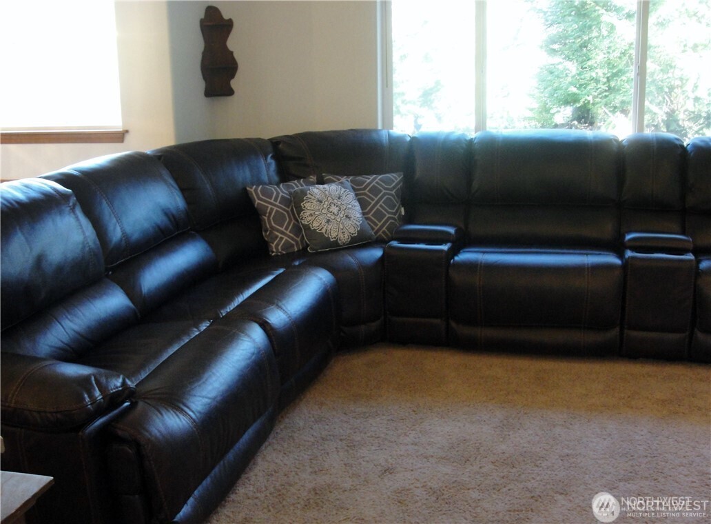 1664 Spruce Ridge Drive Camano Island, WA 98282 - Photo 4 of 24 a living room with furniture