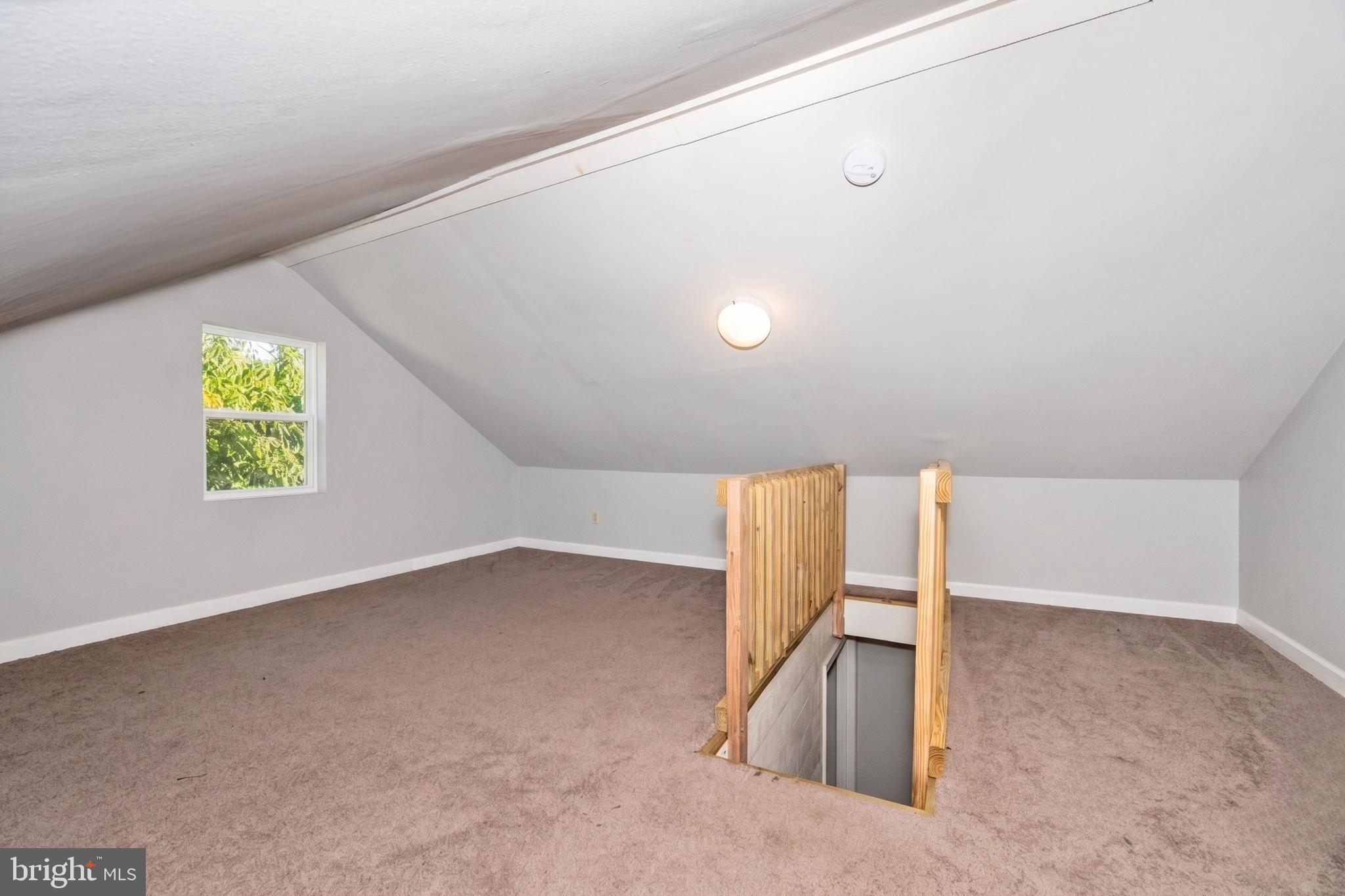 808 Knoxville Road Knoxville, MD 21758 - Photo 9 of 14 an empty room with a window
