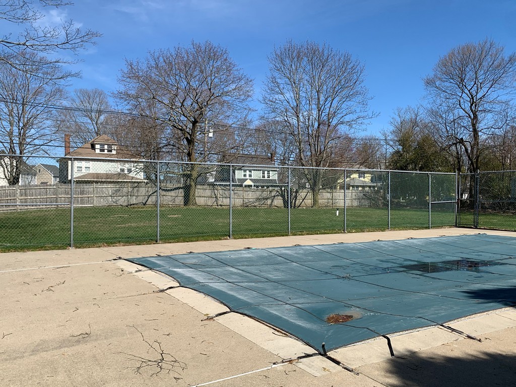 96 Main Street, Unit C4 Foxboro, MA 02035 - Photo 14 of 14 a view of pool with tall trees