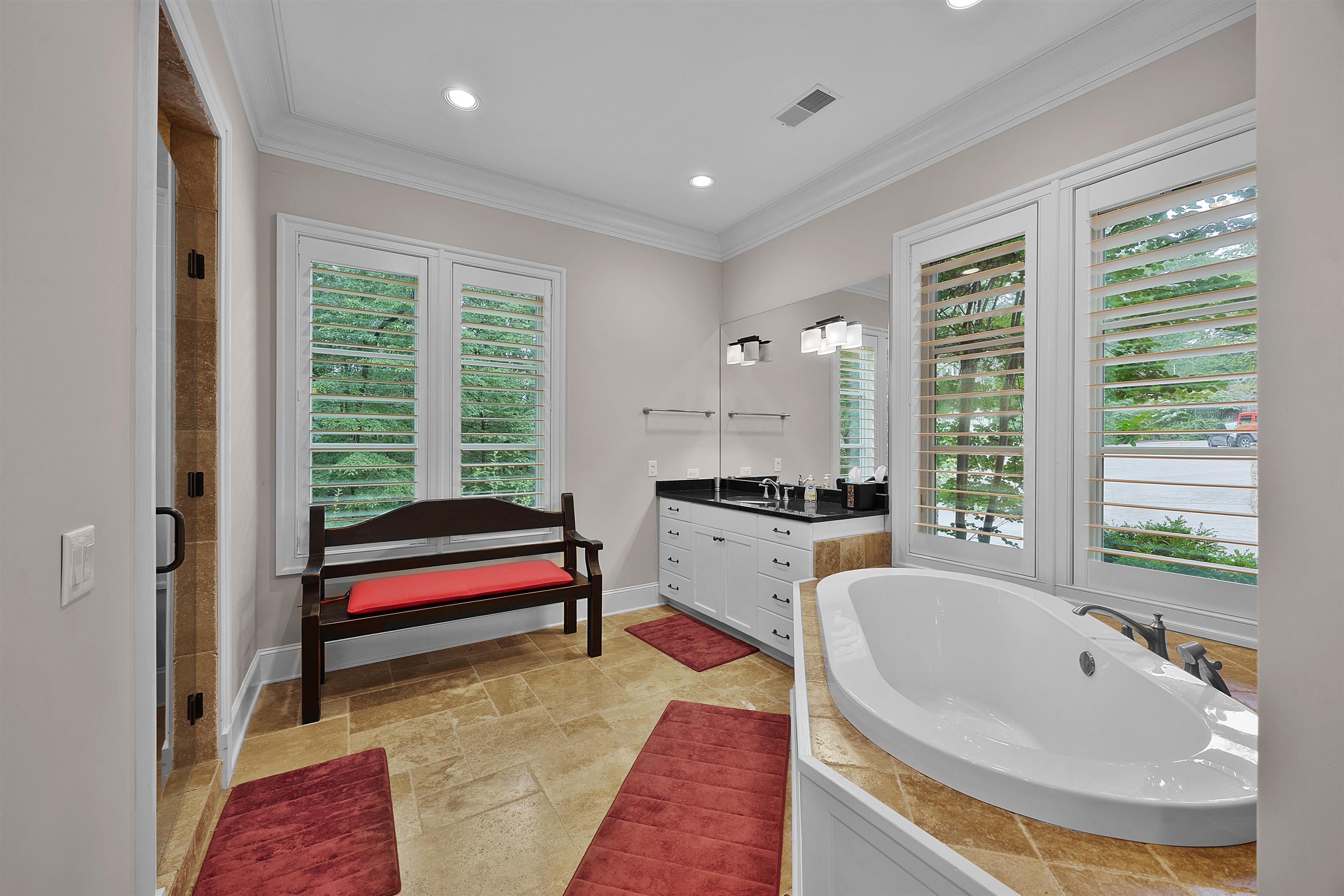 25 Caney Hollow Road Counce, TN 38326 - Photo 17 of 40 Bathroom with plenty of natural light, a freestanding tub, baseboards, ornamental molding, and recessed lighting