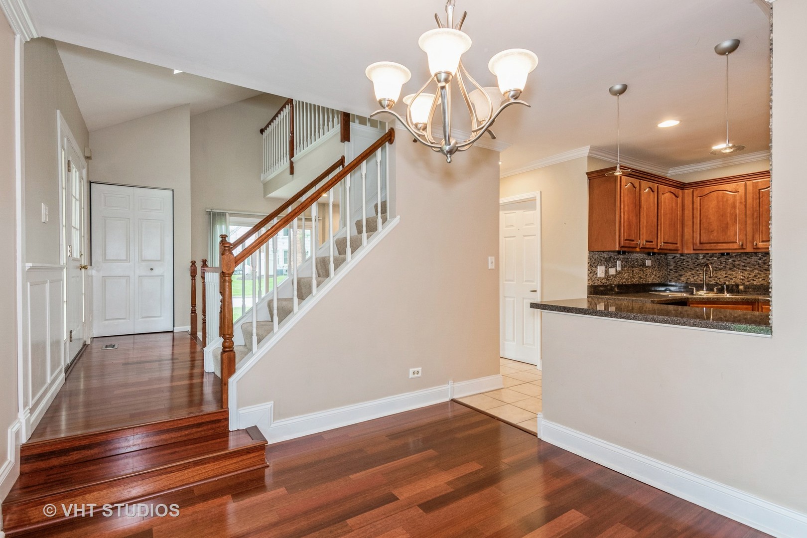501 Crossing Court Rolling Meadows, IL 60008 - Photo 6 of 14 a view of a kitchen with wooden floor and staircase