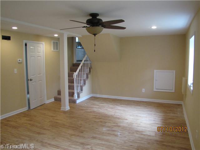 4770 Pine Hall Road Walkertown, NC 27051 - Photo 11 of 16 Den/Family/Great Room. Finished Basement. Extra Square footage around the corner.