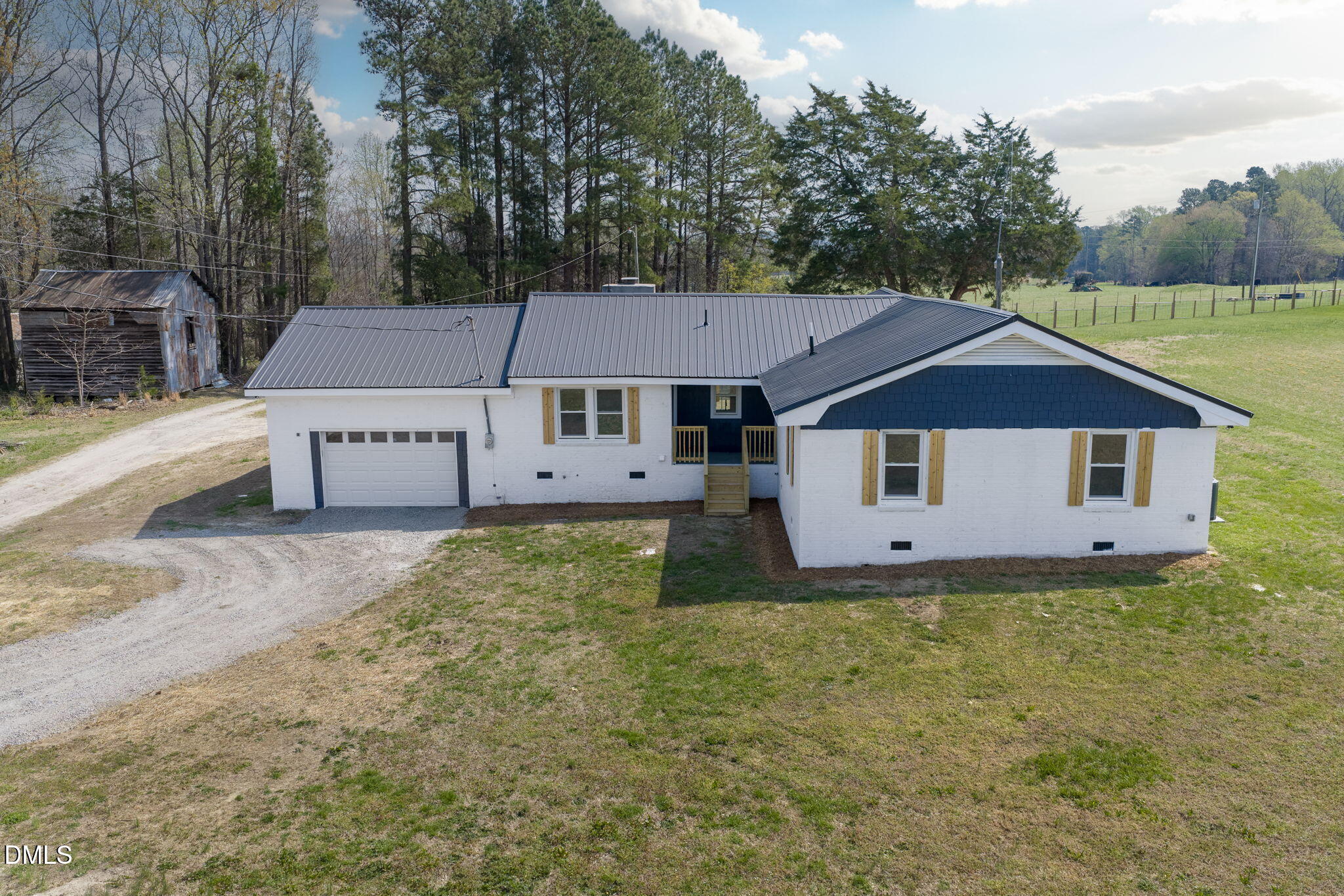 426 Rooker Dairy Road Norlina, NC 27563 - Photo 2 of 33 a front view of a house with a yard