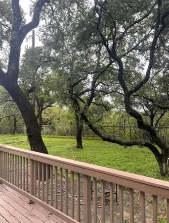 a view of deck with a backyard