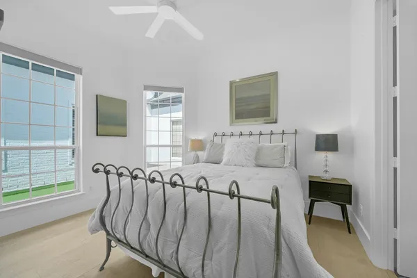 a bed room with furniture and a window