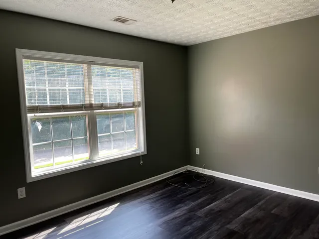 a view of a room with a window