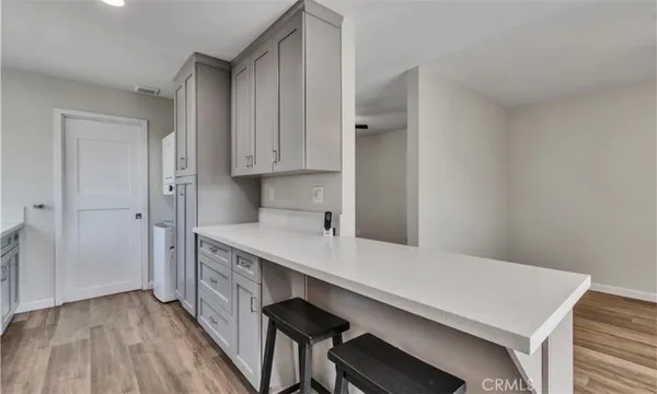 a room with a table and chairs