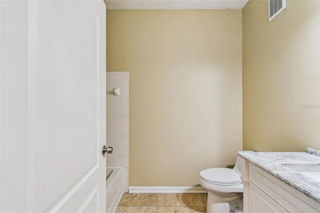 an aerial view of a house with pool lake view and mountain view