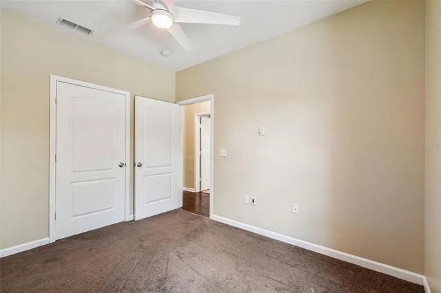an aerial view of a house with a swimming pool